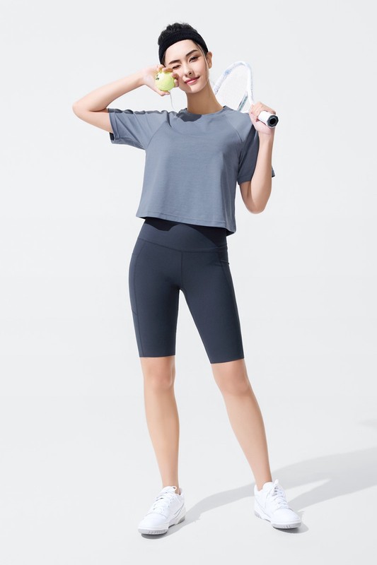 吸排附口袋中度五分緊身短褲-女